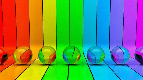 Vibrant Rainbow Reflection with Colorful Balls wallpaper