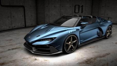 Sleek Blue Supercar in an Urban Setting wallpaper