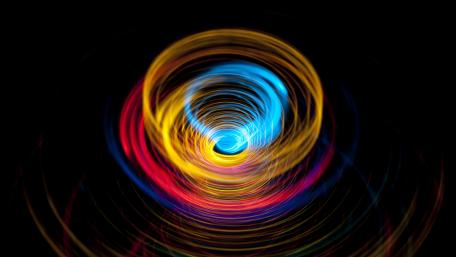 Vibrant Swirls of Colorful Energy wallpaper