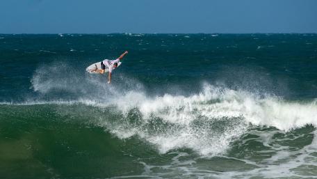 Epic Surfing Action in the Waves wallpaper