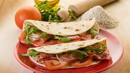 Delicious Fresh Sandwich Wraps Tempting Flavor Combination wallpaper