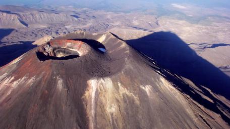 Majestic Volcano Overlooking Vast Landscape wallpaper