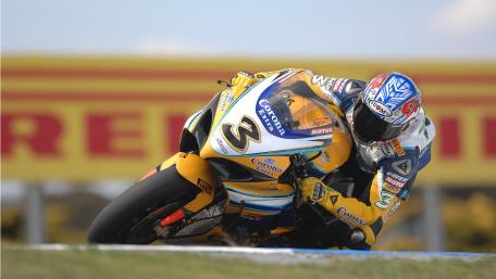 Thrilling Motorcycle Racing Action Wallpaper wallpaper