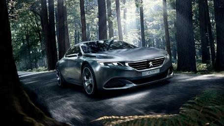 Futuristic Car Racing Through a Mystical Forest wallpaper