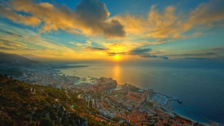 Breathtaking Sunset Over a Vibrant Cityscape wallpaper