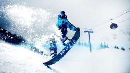 Thrilling Snowboarding Adventure on Fresh Powder Snow wallpaper