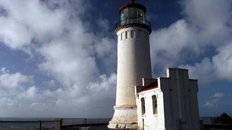 Lighthouse Against Dramatic Sky wallpaper
