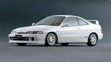 Sleek and Sporty White Car Wallpaper wallpaper