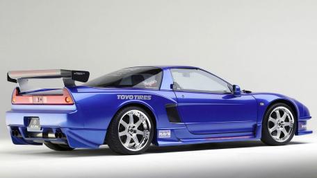 Sleek Blue Sports Car Wallpaper for Enthusiasts wallpaper