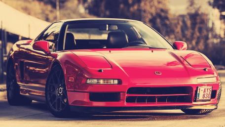 Sleek Red Sports Car Wallpaper wallpaper