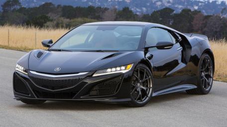 Sleek Black Sports Car Wallpaper wallpaper