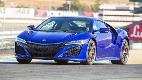 Sleek Blue Supercar on the Track wallpaper