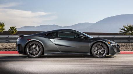 Sleek and Stylish Modern Sports Car Wallpaper wallpaper