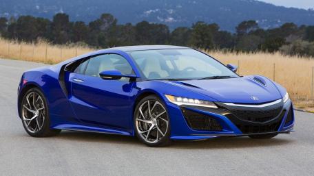 Sleek Blue Sports Car Wallpaper wallpaper