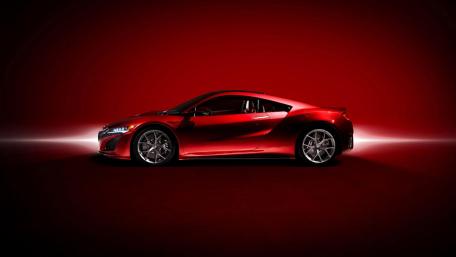 Sleek Red Sportscar Wallpaper wallpaper