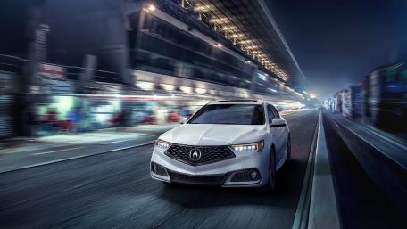 Sleek Acura in Motion on the Racing Track wallpaper