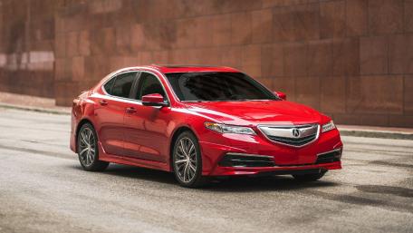 Sleek Red Luxury Sedan Wallpaper wallpaper