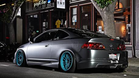Sleek Urban Car Night Scene wallpaper