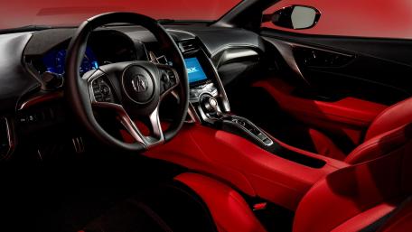 Sleek Sports Car Interior Design with Bold Red Accents wallpaper