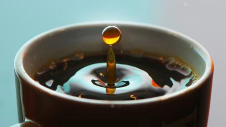 Coffee Drop Splendor in Motion wallpaper