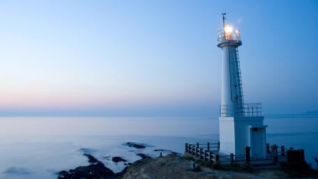 Serene Lighthouse by Tranquil Waters wallpaper