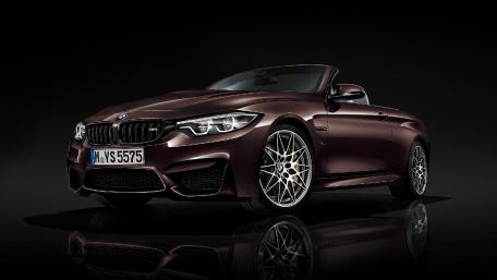 Sleek BMW Convertible in Stunning Maroon Finish wallpaper