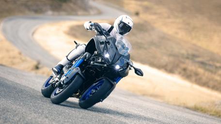 Dynamic Three-Wheeled Motorcycle Adventure Wallpaper wallpaper