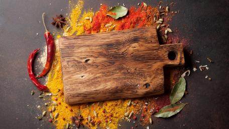 Vibrant Spices and Rustic Cutting Board Wallpaper wallpaper