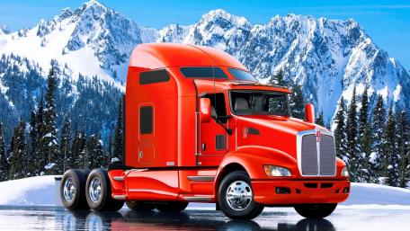Vibrant Truck Against Majestic Mountains wallpaper