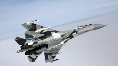 Sleek Fighter Jet in Flight. wallpaper