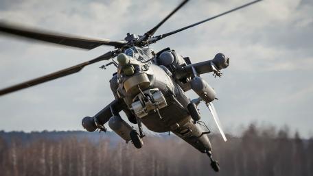 Dynamic Military Helicopter in Action wallpaper