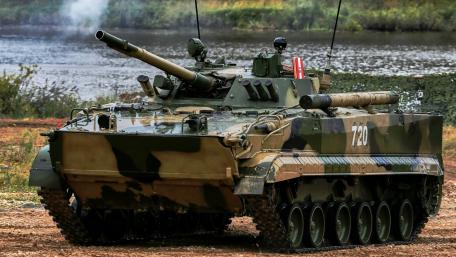 Powerful Military Tank on the Field wallpaper