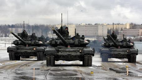 Military Tanks on Display in Winter Setting wallpaper