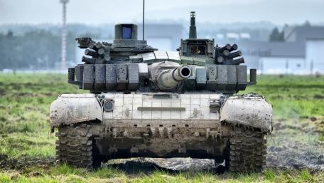 Powerful Tank Ready for Action in the Field wallpaper
