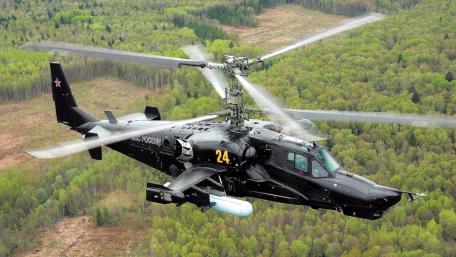 Black Attack Helicopter in Flight wallpaper