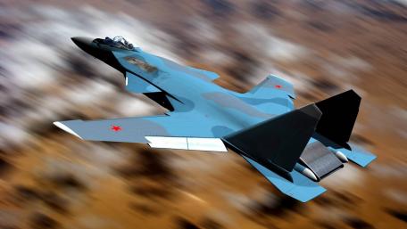 Futuristic Military Jet in Action wallpaper