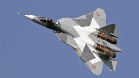 Sleek Fighter Jet in Mid-Flight Displaying Precision Engineering wallpaper