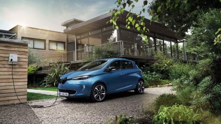 Modern Electric Car in a Serene Setting wallpaper