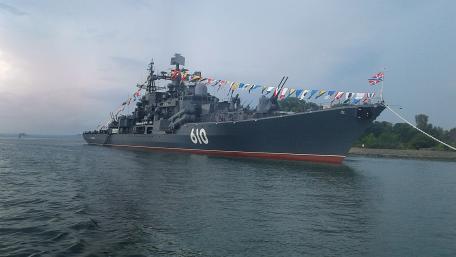 Majestic Warship Under a Cloudy Sky wallpaper