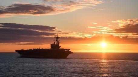 Majestic Aircraft Carrier at Sunset wallpaper
