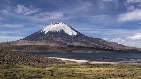 Majestic Snow-Capped Mountain Landscape Decorates Nature Wallpaper wallpaper