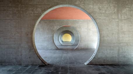 Ethereal Circular Pathways in Concrete Structures wallpaper