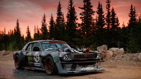 Classic Drift Car in Stunning Sunset Scene wallpaper