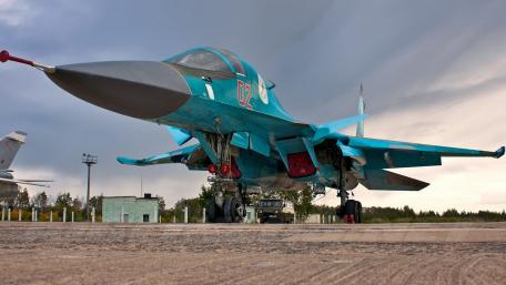 Imposing Military Aircraft on the Tarmac wallpaper