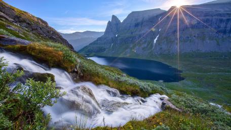 Majestic Mountain Landscape with Serene Waterfall and Lake wallpaper