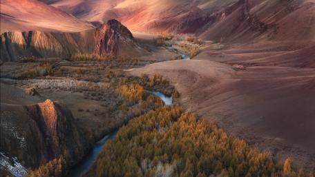 Stunning River Carving Through Autumn Valleys wallpaper