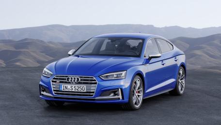 Sleek Blue Audi S5 on Scenic Terrain wallpaper
