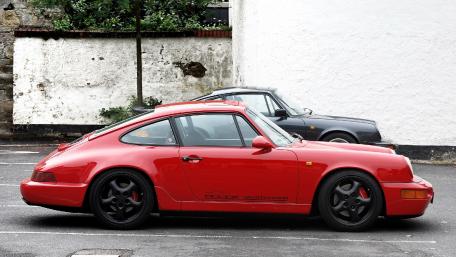 Classic Red Sports Car Wallpaper for Enthusiasts wallpaper