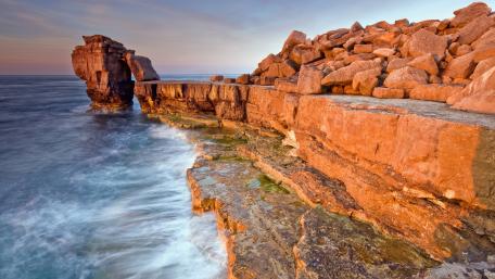 Serene Coastal Landscape at Sunset wallpaper