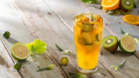 Refreshing Citrus Delight with Fresh Fruit Garnish wallpaper